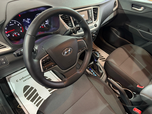 Hyundai Solaris Специальная Серия "10 лет" + Comfort, 2021 года, пробег 64726 км